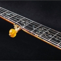 SPIRIT - 24 frets, engraved gold / black, abalone strip