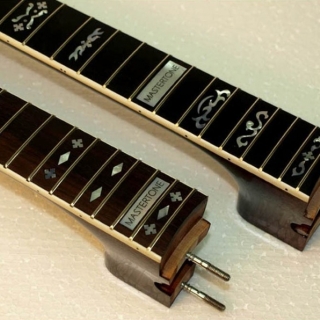 Old style inlay pattern on new necks